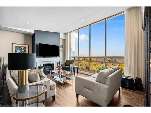 Ph6-2175 Marine Drive, Oakville, ON - Indoor Photo Showing Living Room With Fireplace