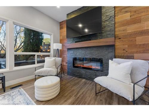 179-2050 Upper Middle Road, Burlington, ON - Indoor Photo Showing Living Room With Fireplace