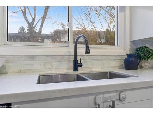 179-2050 Upper Middle Road, Burlington, ON - Indoor Photo Showing Kitchen With Double Sink