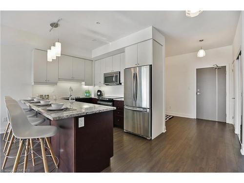 311-128 Garden Drive, Oakville, ON - Indoor Photo Showing Kitchen With Upgraded Kitchen