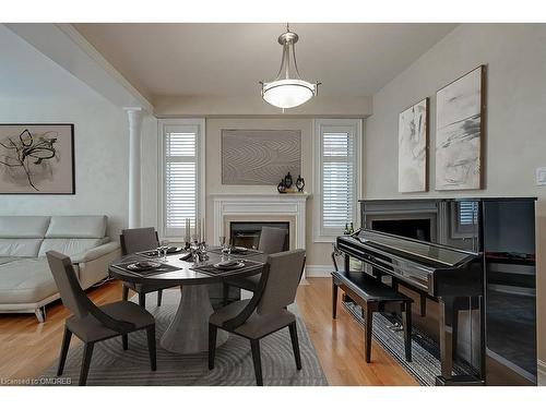 2452 North Ridge Crescent, Oakville, ON - Indoor Photo Showing Dining Room With Fireplace