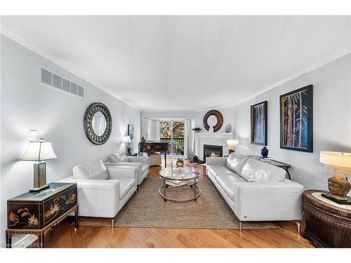 15-2155 Duncaster Drive, Burlington, ON - Indoor Photo Showing Living Room With Fireplace