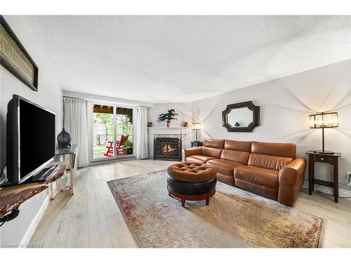 15-2155 Duncaster Drive, Burlington, ON - Indoor Photo Showing Living Room With Fireplace