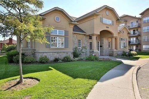 105-1490 Bishops Gate, Oakville, ON - Outdoor With Facade