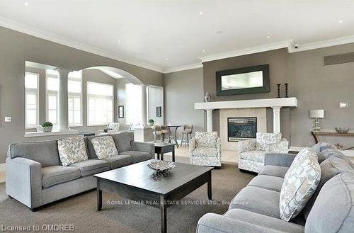 105-1490 Bishops Gate, Oakville, ON - Indoor Photo Showing Living Room With Fireplace