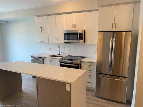 117-128 Grovewood Common, Oakville, ON - Indoor Photo Showing Kitchen With Stainless Steel Kitchen With Upgraded Kitchen