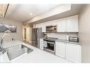 102-4 Tree Tops Lane, Huntsville, ON  - Indoor Photo Showing Kitchen With Double Sink 