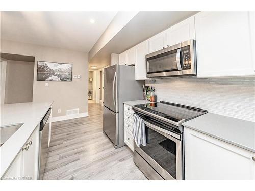 102-4 Tree Tops Lane, Huntsville, ON - Indoor Photo Showing Kitchen