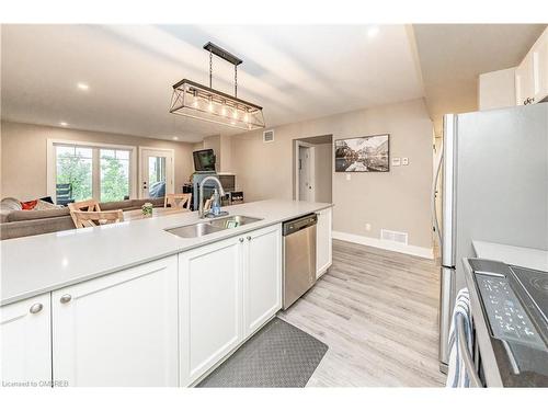 102-4 Tree Tops Lane, Huntsville, ON - Indoor Photo Showing Kitchen With Double Sink