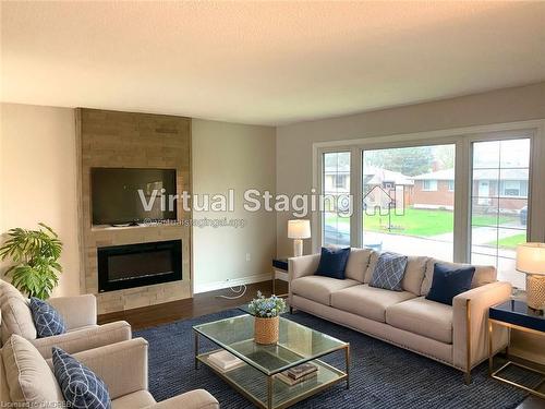 32 Bendingroad Crescent, St. Catharines, ON - Indoor Photo Showing Living Room With Fireplace