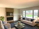 32 Bendingroad Crescent, St. Catharines, ON  - Indoor Photo Showing Living Room With Fireplace 