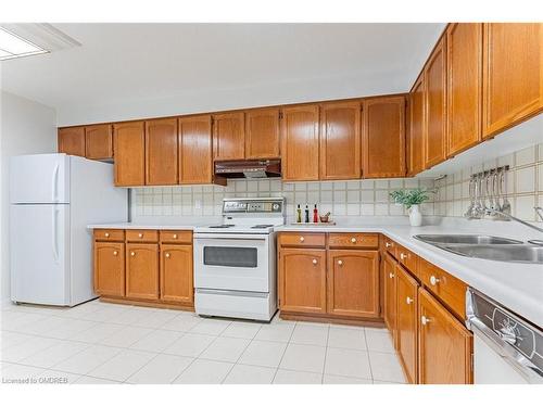 202-2175 Marine Drive, Oakville, ON - Indoor Photo Showing Kitchen With Double Sink