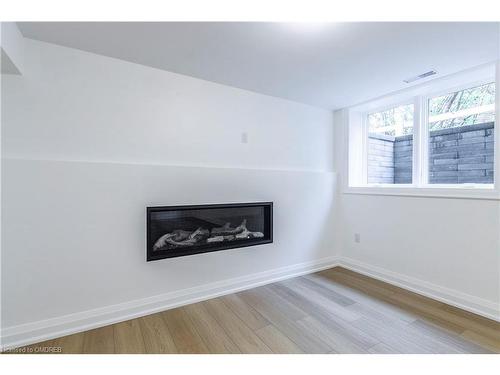 256 Ridge Drive, Milton, ON - Indoor Photo Showing Living Room With Fireplace