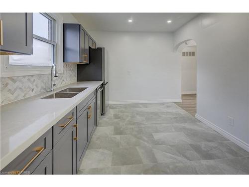 196 Queensdale Avenue E, Hamilton, ON - Indoor Photo Showing Kitchen With Double Sink