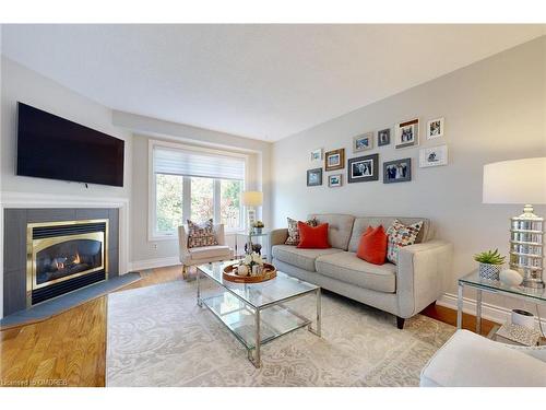 6-2215 Cleaver Avenue, Burlington, ON - Indoor Photo Showing Living Room With Fireplace