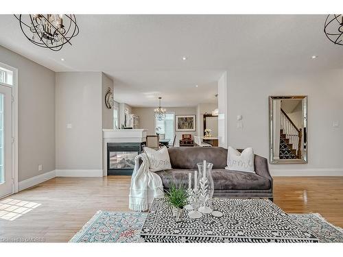 2-128 Morden Road, Oakville, ON - Indoor Photo Showing Living Room With Fireplace