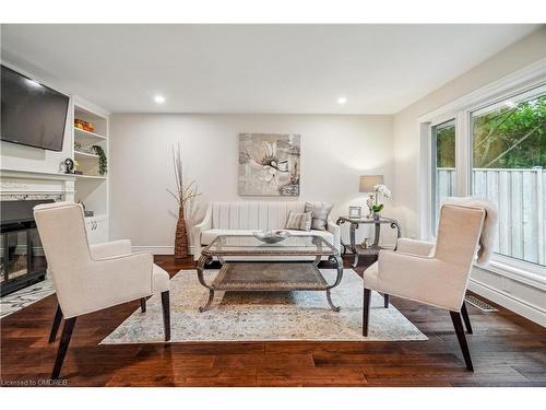 3-1513 Upper Middle Road, Burlington, ON - Indoor Photo Showing Living Room With Fireplace