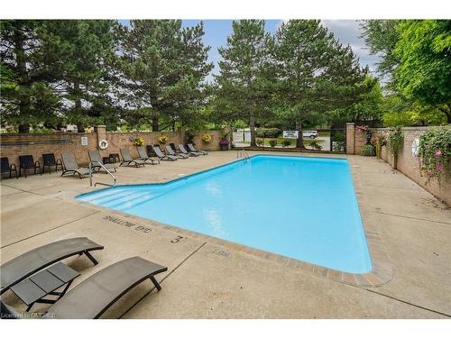 3-1513 Upper Middle Road, Burlington, ON - Outdoor With In Ground Pool With Backyard