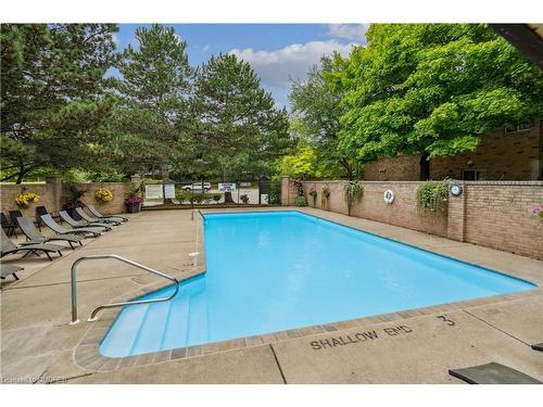 3-1513 Upper Middle Road, Burlington, ON - Outdoor With In Ground Pool