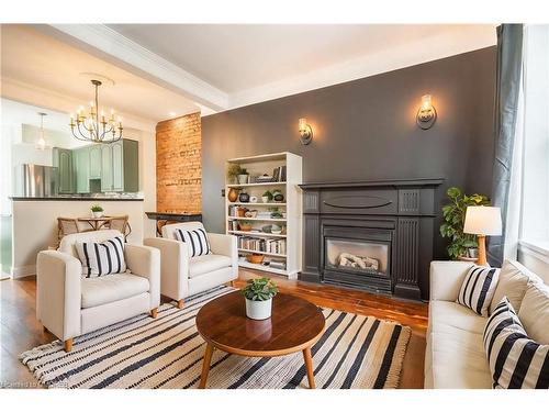 2-279 Main Street W, Hamilton, ON - Indoor Photo Showing Living Room With Fireplace