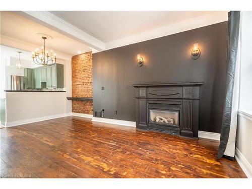 2-279 Main Street W, Hamilton, ON - Indoor Photo Showing Living Room With Fireplace