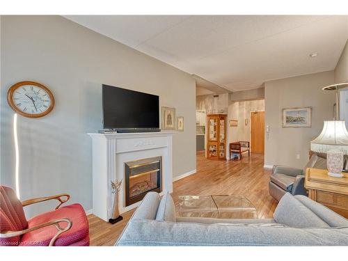 316-2085 Amherst Heights Drive, Burlington, ON - Indoor Photo Showing Living Room With Fireplace