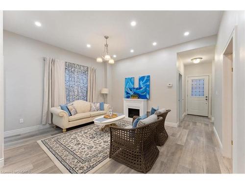 72 Leeming Street, Hamilton, ON - Indoor Photo Showing Living Room With Fireplace