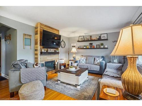 391 East 16Th Street, Hamilton, ON - Indoor Photo Showing Living Room With Fireplace