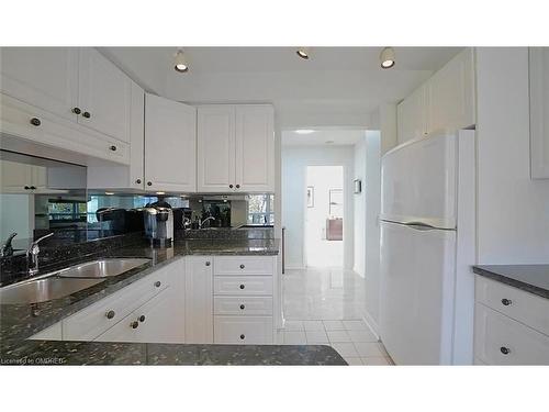 301-2190 Lakeshore Road, Burlington, ON - Indoor Photo Showing Kitchen With Double Sink