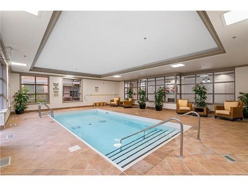 1104-100 Burloak Drive, Burlington, ON - Indoor Photo Showing Other Room With In Ground Pool