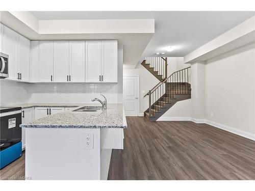 117-1569 Rose Way, Milton, ON - Indoor Photo Showing Kitchen With Double Sink With Upgraded Kitchen