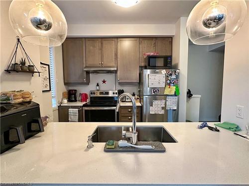 98-30 Times Square Boulevard, Hamilton, ON - Indoor Photo Showing Kitchen With Double Sink