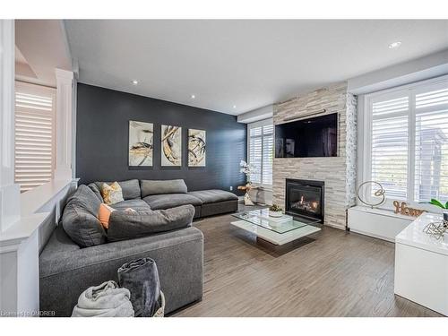 309 Vienna Street Street, Hamilton, ON - Indoor Photo Showing Living Room With Fireplace