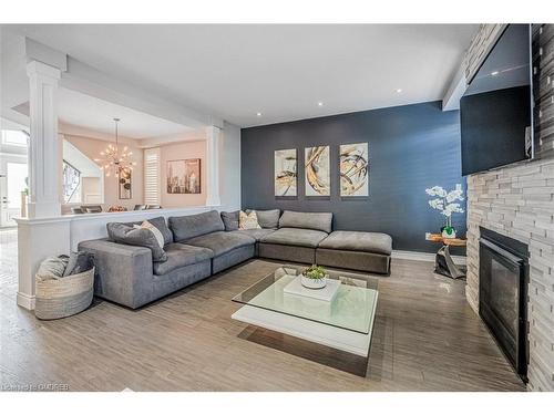 309 Vienna Street Street, Hamilton, ON - Indoor Photo Showing Living Room With Fireplace