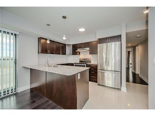 718-138 Widdicombe Hill Boulevard, Etobicoke, ON - Indoor Photo Showing Kitchen With Stainless Steel Kitchen With Upgraded Kitchen