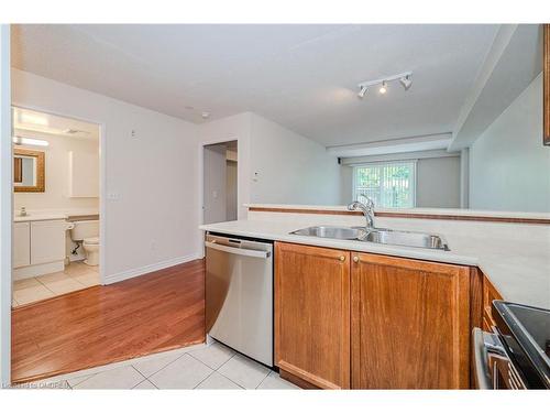 103-2300 Parkhaven Boulevard, Oakville, ON - Indoor Photo Showing Kitchen With Double Sink