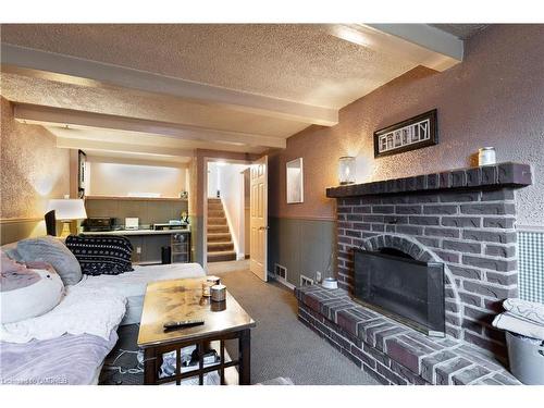 35 Parkland Crescent, Kitchener, ON - Indoor Photo Showing Living Room With Fireplace