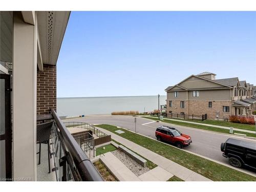 207-10 Esplanade Lane, Grimsby, ON - Outdoor With Body Of Water