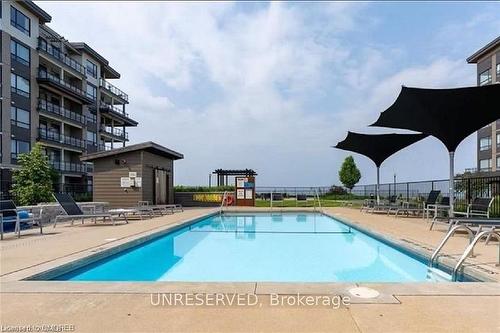 207-10 Esplanade Lane, Grimsby, ON - Outdoor With In Ground Pool