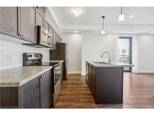 522-118 King Street E, Hamilton, ON - Indoor Photo Showing Kitchen With Upgraded Kitchen