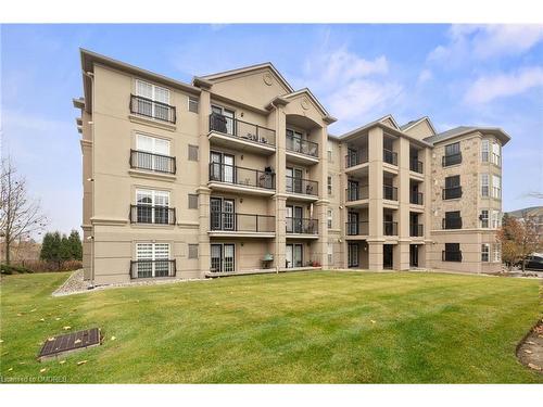 304-1479 Maple Avenue, Milton, ON - Outdoor With Balcony With Facade