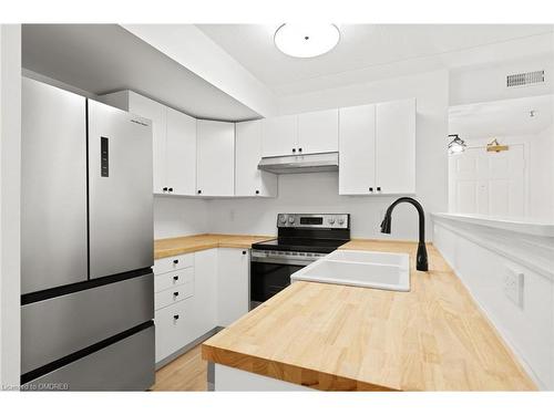 304-1479 Maple Avenue, Milton, ON - Indoor Photo Showing Kitchen With Double Sink