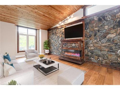 20 Tasker Street, St. Catharines, ON - Indoor Photo Showing Living Room With Fireplace