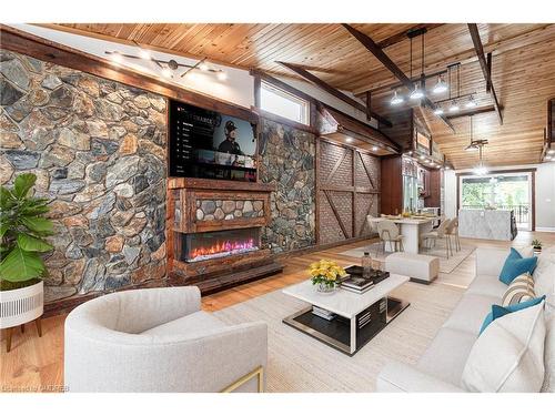 20 Tasker Street, St. Catharines, ON - Indoor Photo Showing Living Room With Fireplace