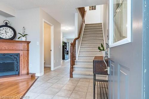 554 Dansbury Drive, Waterloo, ON - Indoor Photo Showing Other Room With Fireplace