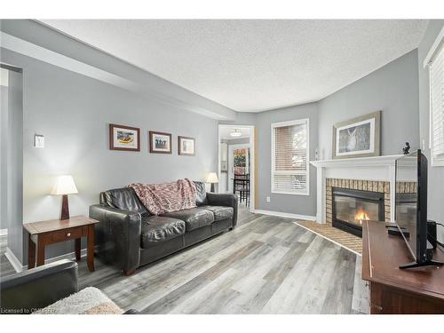 78 Lauchlin Crescent, Georgetown, ON - Indoor Photo Showing Living Room With Fireplace