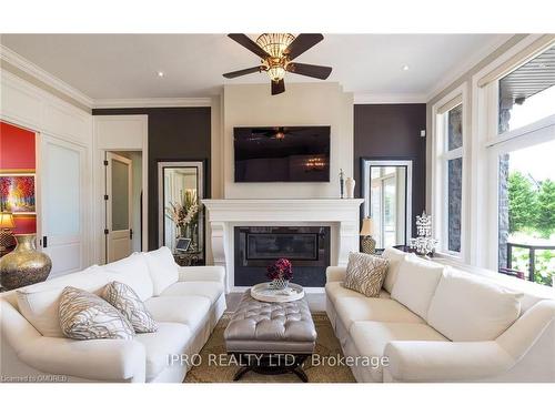 45-11 Lambeth Lane, Puslinch, ON - Indoor Photo Showing Living Room With Fireplace