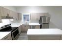 39-550 Grey Street, Brantford, ON  - Indoor Photo Showing Kitchen With Double Sink 