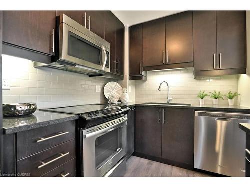 103-128 Garden Drive, Oakville, ON - Indoor Photo Showing Kitchen With Upgraded Kitchen