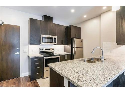 311-118 King Street E, Hamilton, ON - Indoor Photo Showing Kitchen With Stainless Steel Kitchen With Double Sink With Upgraded Kitchen